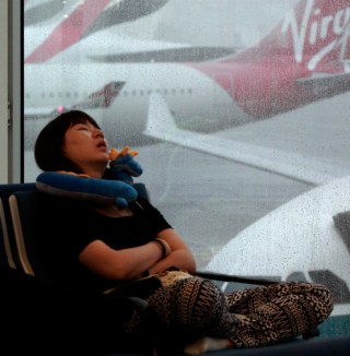 Airport sleeper woman